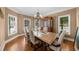 Formal dining room featuring hardwood floors, wainscoting, and natural light at 3086 Frazier Walk, Decatur, GA 30033