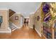 Inviting entryway showcasing hardwood floors, staircase, and neutral paint at 3086 Frazier Walk, Decatur, GA 30033
