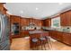 Spacious kitchen with stainless steel appliances and a large island at 3086 Frazier Walk, Decatur, GA 30033