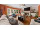 Spacious living room boasts built-in shelves, a fireplace, and bay windows at 3086 Frazier Walk, Decatur, GA 30033