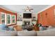 Inviting living room with fireplace, built-ins, natural light from the windows, and open layout at 3086 Frazier Walk, Decatur, GA 30033