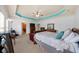 Bright and airy main bedroom boasts a tray ceiling, large windows, and a spacious layout with ensuite bathroom access at 3086 Frazier Walk, Decatur, GA 30033