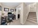 Home office featuring desk, chair, staircase and natural light at 3086 Frazier Walk, Decatur, GA 30033