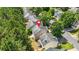 Aerial view of home with private backyard and surrounding neighborhood at 3454 Carriage Chase Rd, Atlanta, GA 30349