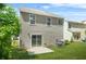 The home boasts a well-maintained lawn with a patio, creating a beautiful outdoor living space at 3454 Carriage Chase Rd, Atlanta, GA 30349