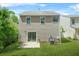The home boasts a well-maintained lawn with a patio, creating a beautiful outdoor living space at 3454 Carriage Chase Rd, Atlanta, GA 30349