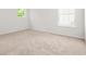 Inviting bedroom space features a neutral carpet and ample natural light from the windows at 3454 Carriage Chase Rd, Atlanta, GA 30349