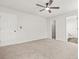 A serene bedroom provides a view into the bathroom and closet at 3454 Carriage Chase Rd, Atlanta, GA 30349
