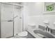Modern bathroom with glass-enclosed shower and white vanity at 5560 Kingsport Ne Dr # 27, Atlanta, GA 30342