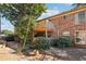 Exterior of the home featuring a back deck and mature trees in the yard at 5560 Kingsport Ne Dr # 27, Atlanta, GA 30342