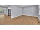 Spacious living room features hardwood floors, custom wall design, and natural light at 1585 Melanie Ct, Decatur, GA 30032