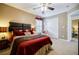 Well-appointed bedroom features carpet, a stylish bed, closet, and natural light from a window at 3620 Chartwell Dr, Suwanee, GA 30024