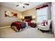 Inviting bedroom featuring carpet, a large bed, decorative wall art, and natural light from a window at 3620 Chartwell Dr, Suwanee, GA 30024
