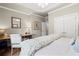 Bright bedroom featuring a built-in desk and neutral decor at 4115 Gold Mill Rdg, Canton, GA 30114
