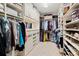 Walk-in closet features custom shelving and ample storage at 4115 Gold Mill Rdg, Canton, GA 30114