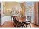 Dining room with hardwood floors, chandelier, and wainscoting at 4115 Gold Mill Rdg, Canton, GA 30114