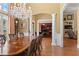 Dining room with chandelier, hardwood floors, and large windows at 4115 Gold Mill Rdg, Canton, GA 30114