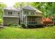 Spacious backyard featuring a screened porch, wood deck and beautifully landscaped yard at 4429 Windsor Oaks Cir, Marietta, GA 30066