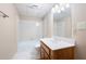 Well-maintained bathroom features a wood vanity and tub-shower combo with neutral colors at 4429 Windsor Oaks Cir, Marietta, GA 30066