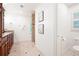 Bathroom with granite countertops, double sinks, and walk-in tiled shower at 4429 Windsor Oaks Cir, Marietta, GA 30066