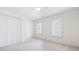 Inviting bedroom with bright white walls, neutral carpet, and shuttered windows at 4429 Windsor Oaks Cir, Marietta, GA 30066