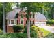 Beautiful brick home with a two-car garage, bay window, and manicured landscaping at 4429 Windsor Oaks Cir, Marietta, GA 30066