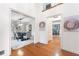 Open foyer view into the dining room with hardwood floors and natural light at 4429 Windsor Oaks Cir, Marietta, GA 30066