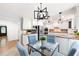 Spacious kitchen with white cabinetry, granite countertops, stainless steel appliances, and a breakfast nook at 4429 Windsor Oaks Cir, Marietta, GA 30066