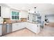 Bright kitchen featuring stainless steel appliances, granite countertops, and custom cabinets at 4429 Windsor Oaks Cir, Marietta, GA 30066