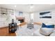 Elegant living room features a fireplace, built-in shelving, and stylish decor at 4429 Windsor Oaks Cir, Marietta, GA 30066