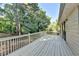 Expansive back deck, perfect for entertaining with serene views of the surrounding trees at 3070 Ascot Ln, Roswell, GA 30076