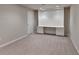 Versatile finished basement area with built-in storage and potential for a home office at 3070 Ascot Ln, Roswell, GA 30076