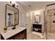 Bright bathroom featuring a double vanity, shower, and tile floor at 3070 Ascot Ln, Roswell, GA 30076