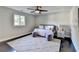 Bright bedroom with stylish daybed, rug, and dark wood floors at 3070 Ascot Ln, Roswell, GA 30076