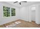 Light-filled bedroom with a view of trees and ample closet space at 4745 Elam Forest Dr, Stone Mountain, GA 30083