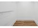 Walk in closet features shelving for clothing at 4745 Elam Forest Dr, Stone Mountain, GA 30083