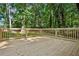 Newly built wooden deck providing ample outdoor space for relaxation and entertainment at 4745 Elam Forest Dr, Stone Mountain, GA 30083