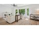 Cozy living room with hardwood floors, an eye-catching bay window, and elegant furniture at 4745 Elam Forest Dr, Stone Mountain, GA 30083