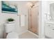 Bathroom featuring a toilet, shower, sink, and art on the wall at 1624 Glenfield Dr, Lawrenceville, GA 30043