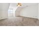 Spacious carpeted bedroom with window and ceiling fan, bathed in natural light at 1624 Glenfield Dr, Lawrenceville, GA 30043