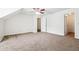 Spacious carpeted bedroom with window, ceiling fan, and closet at 1624 Glenfield Dr, Lawrenceville, GA 30043