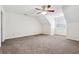Spacious carpeted bedroom with window and ceiling fan, bathed in natural light at 1624 Glenfield Dr, Lawrenceville, GA 30043