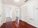 Hallway featuring hardwood floors, closet and doorways leading to other rooms at 1624 Glenfield Dr, Lawrenceville, GA 30043