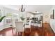 Eat-in kitchen features stainless steel appliances, granite counters, and hardwood floors at 1624 Glenfield Dr, Lawrenceville, GA 30043