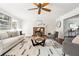 Bright living room boasts hardwood floors, a fireplace, and an open floor plan at 1624 Glenfield Dr, Lawrenceville, GA 30043