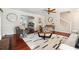 Bright living room boasts hardwood floors, a fireplace, and an open floor plan at 1624 Glenfield Dr, Lawrenceville, GA 30043