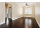 Comfortable bedroom featuring hardwood floors, a ceiling fan, and recessed lighting at 169 Waterman Se St, Marietta, GA 30060