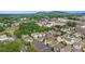 Beautiful aerial view of the neighborhood's houses, lush trees, and scenic mountain backdrop at 169 Waterman Se St, Marietta, GA 30060