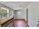 Walk-in closet with shelving and hardwood floors, offering ample storage space at 1834 Broad Ave, Atlanta, GA 30344