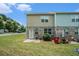 Well-kept backyard showing a patio and grassy area, perfect for outdoor activities at 2039 Wildflower Nw Way, Conyers, GA 30012